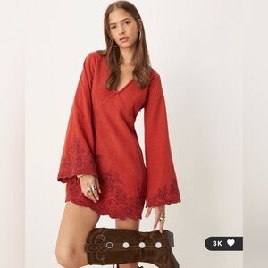 Red corduroy dress with detailing